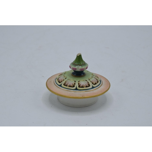 63 - Hadley's Worcester faience lidded vase with a guilded floral decoration. In good condition with no o... 