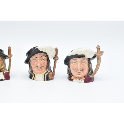 91 - Miniature Royal Doulton character jugs of the Three Musketeers with D'artagnan (4). In good conditio... 