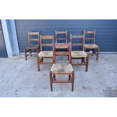 324 - A collection of 6 Victorian ladder back farmhouse chairs with rush seats (All near matching) (6). In... 