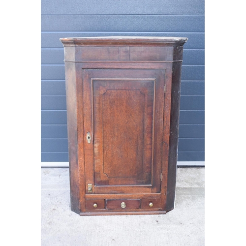 313 - Georgian oak corner cupboard with 3 drawers.  with age related wear.  105 x 76 x 46cm