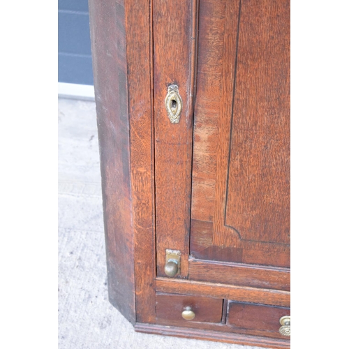 313 - Georgian oak corner cupboard with 3 drawers.  with age related wear.  105 x 76 x 46cm