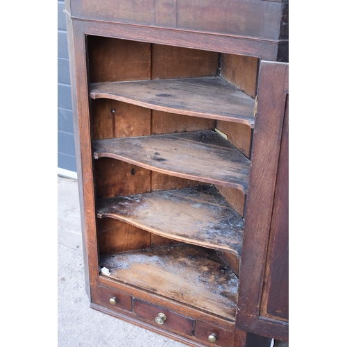 313 - Georgian oak corner cupboard with 3 drawers.  with age related wear.  105 x 76 x 46cm