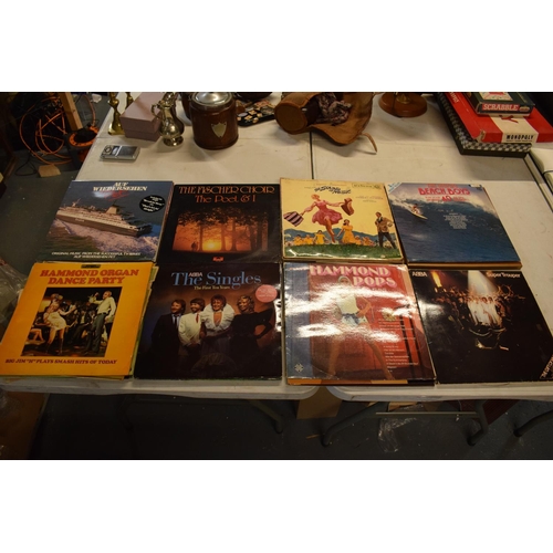 10 - A collection to mainly 12'' LPs and vinyls to include artists such as ABBA, the Beach Boys, Carpente... 