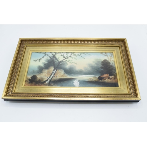 108 - Victorian hand painted tile in later frame: Riverscape with swan, measures 40cm x 24cm including fra... 