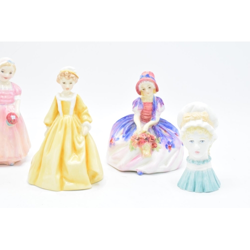 116 - A collection of Royal Doulton figures to include Monica HN1467, Tinkle Bell HN1677, Paisley Shawl M4... 