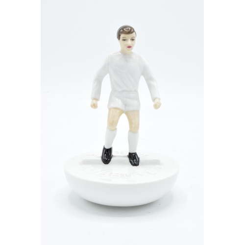 122 - Royal Doulton Subbuteo figure in a white kit with black boots. This is a trial piece and only has th... 