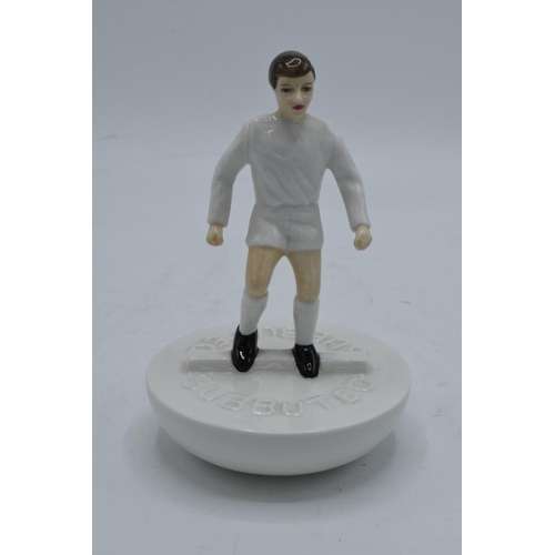 122 - Royal Doulton Subbuteo figure in a white kit with black boots. This is a trial piece and only has th... 