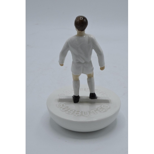 122 - Royal Doulton Subbuteo figure in a white kit with black boots. This is a trial piece and only has th... 