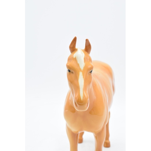 162 - Beswick palomino horse. In good condition with no obvious damage or restoration.