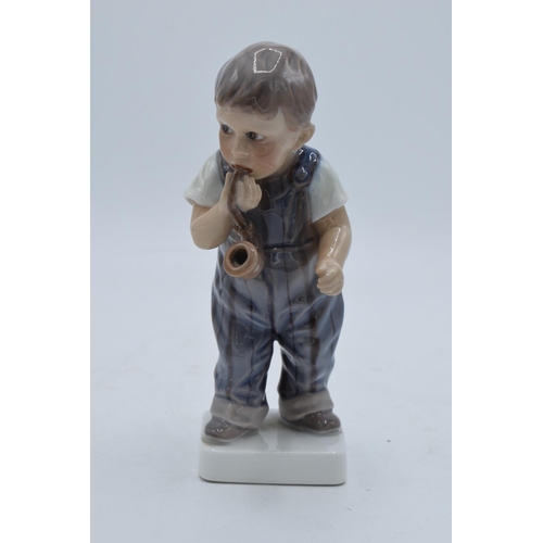 200 - Dahl Jensen of Copenhagen figure of a boy with pipe 1027. In good condition with no obvious damage o... 