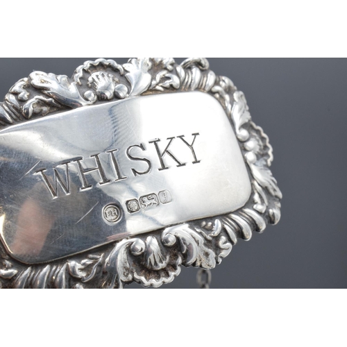 209 - Silver decanter label for whisky. Sheffield 1983. 13.0 grams.