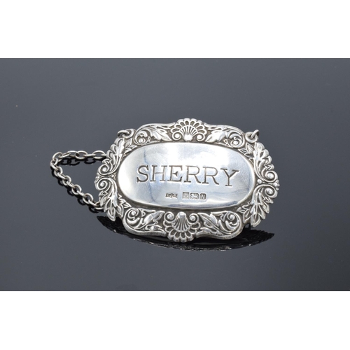 213 - Silver decanter label for sherry. Birmingham 1987. 12.2 grams.