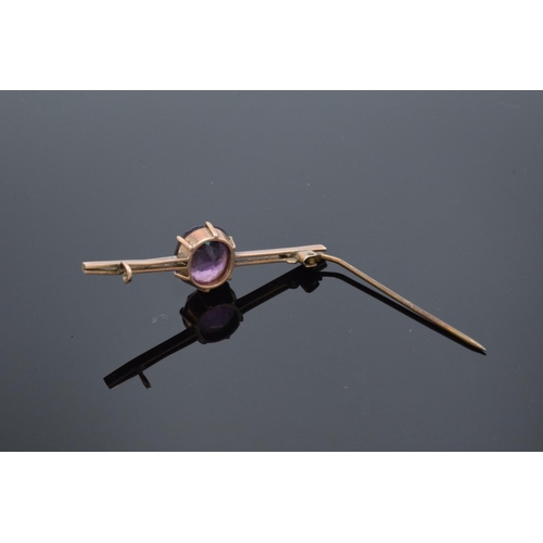 217 - 9ct gold ladies brooch set with an amethyst stone with a base metal pin. 4.6 grams gross weight. Sma... 