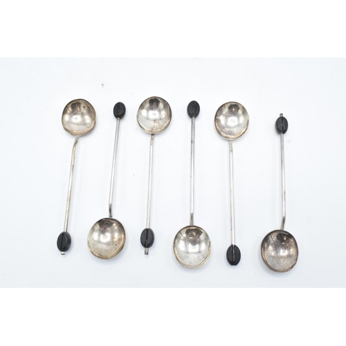 222 - A set of 6 silver tea spoons with a leather effect bobble. 41.3 grams gross weight. Birmingham 1923.