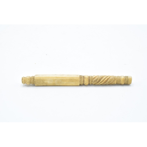 229 - 19th century carved ivory parasol handle: Measures 15.25 cm long.  Chipping to bottom turning