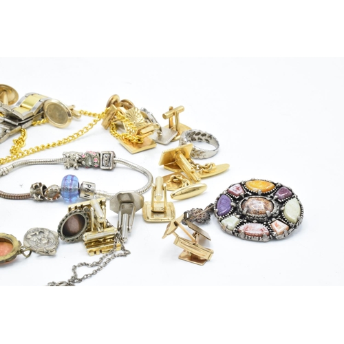 231 - A collection of jewellery that includes 58 grams of silver / silver coloured metal items, Pandora st... 