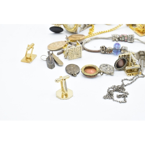 231 - A collection of jewellery that includes 58 grams of silver / silver coloured metal items, Pandora st... 