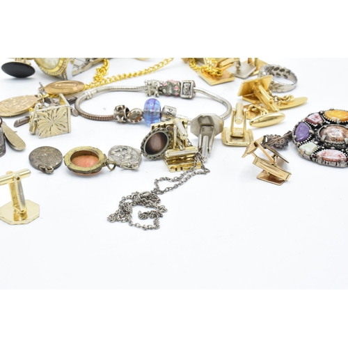 231 - A collection of jewellery that includes 58 grams of silver / silver coloured metal items, Pandora st... 