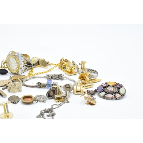 231 - A collection of jewellery that includes 58 grams of silver / silver coloured metal items, Pandora st... 