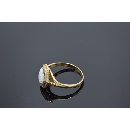 233 - 9ct gold ring set with a oval stone. 2.5 grams gross weight. UK size S. Full hallmarks.