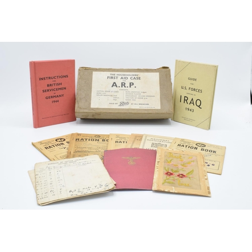 243 - An interesting grouping of WWII memorabilia & ephemera: Comprises ARP first aid kit with various ite... 