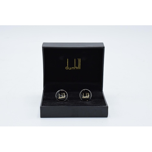 245 - A pair of Alfred Dunhill cufflinks in the original presentation box. In used condition