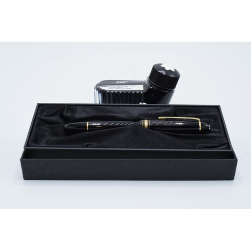 249 - Mont Blanc fountain pen with a 14k nib in original presentation pack and the contents of a ink bottl... 