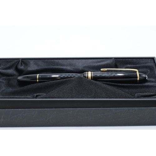 249 - Mont Blanc fountain pen with a 14k nib in original presentation pack and the contents of a ink bottl... 