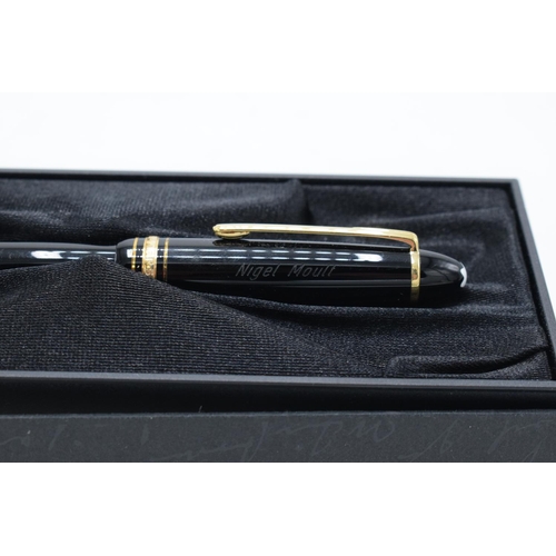 249 - Mont Blanc fountain pen with a 14k nib in original presentation pack and the contents of a ink bottl... 