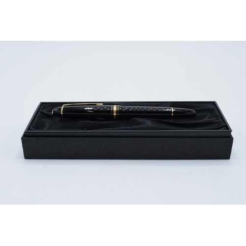 249 - Mont Blanc fountain pen with a 14k nib in original presentation pack and the contents of a ink bottl... 