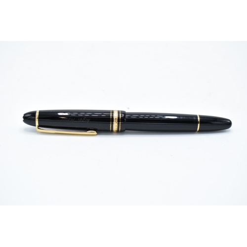 249 - Mont Blanc fountain pen with a 14k nib in original presentation pack and the contents of a ink bottl... 