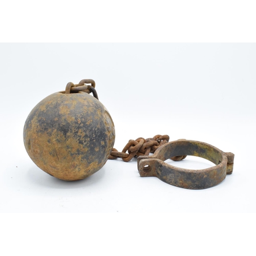 251 - Antique 19th century cast iron prisoner's ball and chain. Working clasp. Signs of corrosion and rust... 