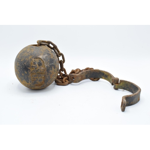 251 - Antique 19th century cast iron prisoner's ball and chain. Working clasp. Signs of corrosion and rust... 