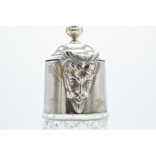 254 - A Falstaff silver plate claret jug with a figural head pouring spout. 28cm tall.