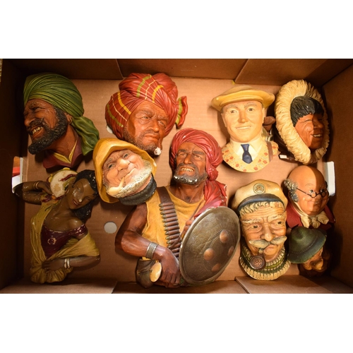 261 - A collection of Bossons and Naturecraft wall plaques to include Golfer, Eskimo, Pickwick etc (10). T... 