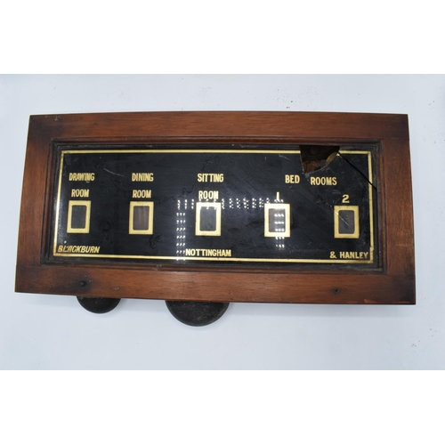 268 - A late 19th/ early 20th century butlers bell box in a wooden frame together with 2 wall mounted butt... 