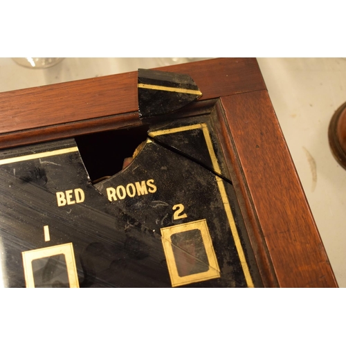 268 - A late 19th/ early 20th century butlers bell box in a wooden frame together with 2 wall mounted butt... 