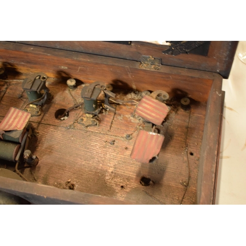 268 - A late 19th/ early 20th century butlers bell box in a wooden frame together with 2 wall mounted butt... 