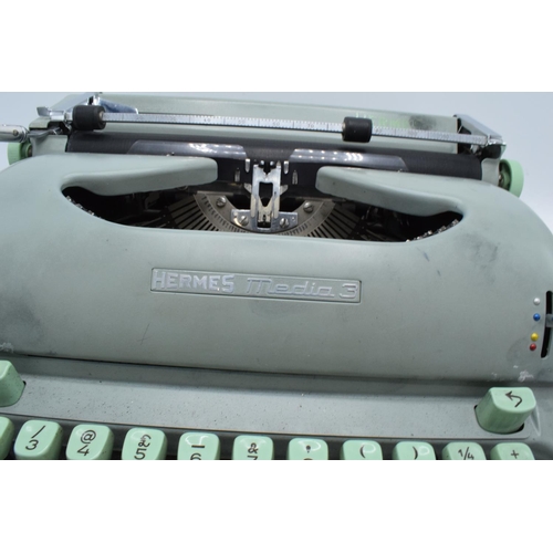 271 - Hermes Media 3 typewriter in case. Untested. Assumed spares/repairs. Some paint loss to the exterior... 