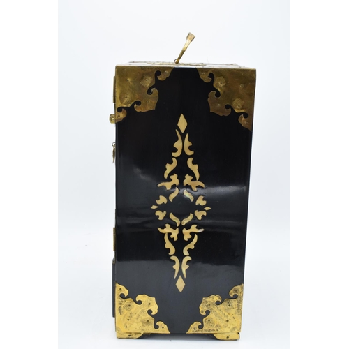 273 - A 20th century Chinese lacquer-style jewellery box with fold and doors and pull out drawers. In good... 