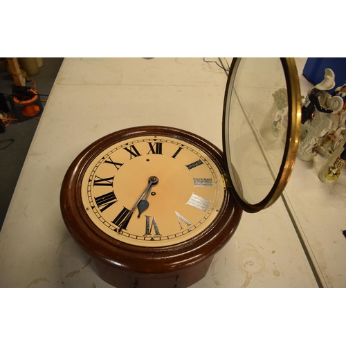 275 - 19th Century mahogany cased circular wall clock with a single fusee movement. With a key. The moveme... 