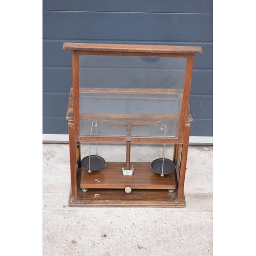 276 - A early-mid 20 century wooden cased set of laboratory scales made WBN of Glasgow. Sold as decorative... 