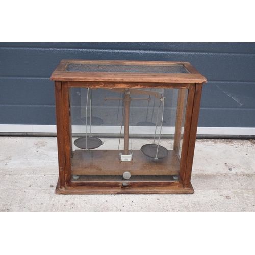 277 - A early-mid 20 century wooden cased set of laboratory scales made WBN of Glasgow. Sold as decorative... 