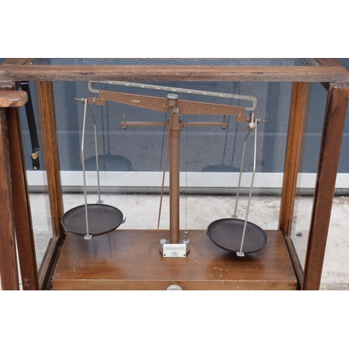 277 - A early-mid 20 century wooden cased set of laboratory scales made WBN of Glasgow. Sold as decorative... 