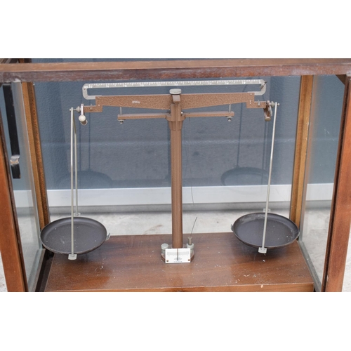 278 - A early-mid 20 century wooden cased set of laboratory scales made WBN of Glasgow. Sold as decorative... 