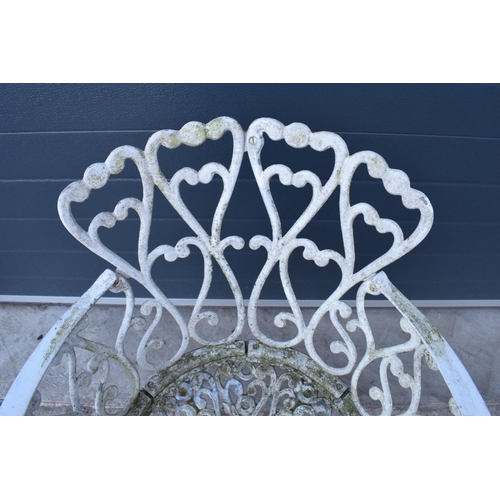 281 - A painted white metal garden chair with a English design back. 81cm tall