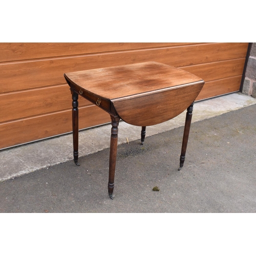 287 - 19th century light mahogany Pembroke table on casters with a single draw and a faux drawer at the op... 