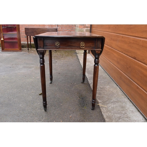 287 - 19th century light mahogany Pembroke table on casters with a single draw and a faux drawer at the op... 