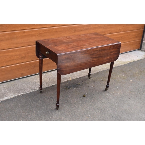 288 - 19th century mahogany Pembroke table on casters with a single draw. In good functional condition. So... 