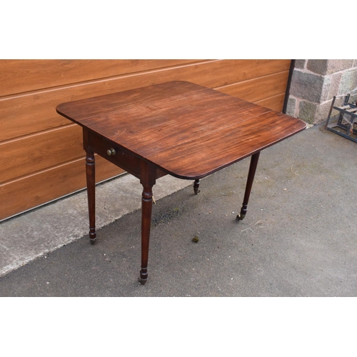 288 - 19th century mahogany Pembroke table on casters with a single draw. In good functional condition. So... 